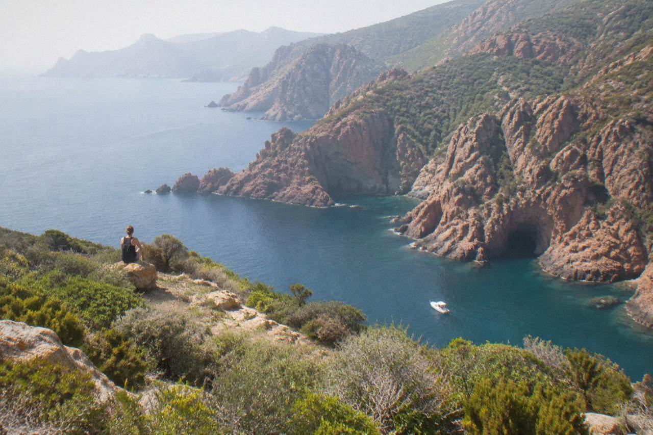 Rocky maquis scrubland on a Corsican hillside above the sea