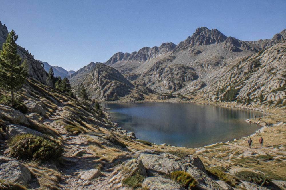 A mountain trail winding through granite slopes high in the Corsican interior