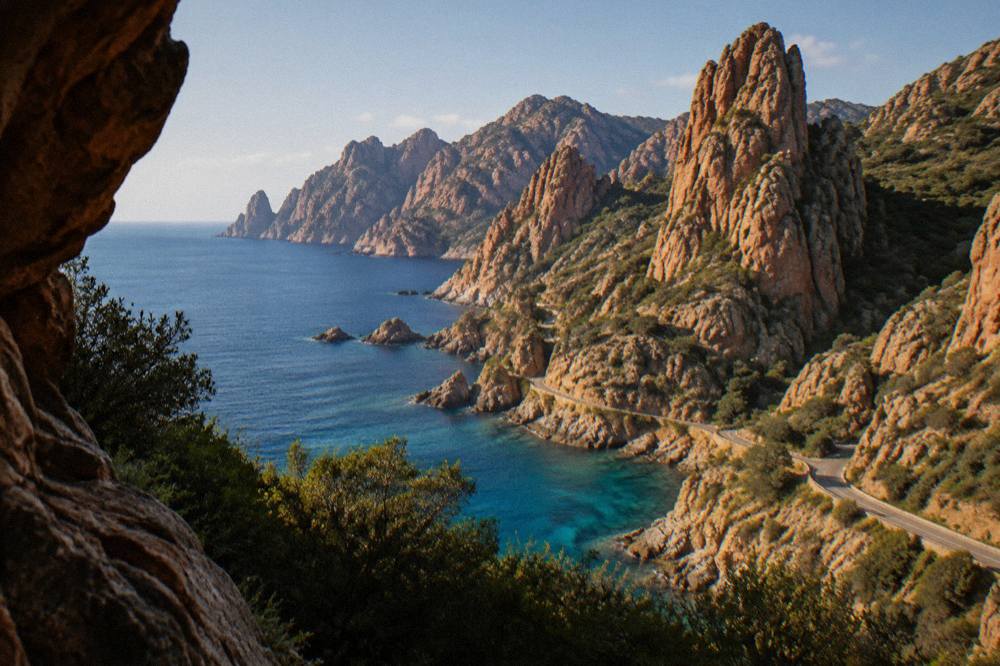 Turquoise water and granite rock formations along the Calanques de Piana on Corsica's west coast