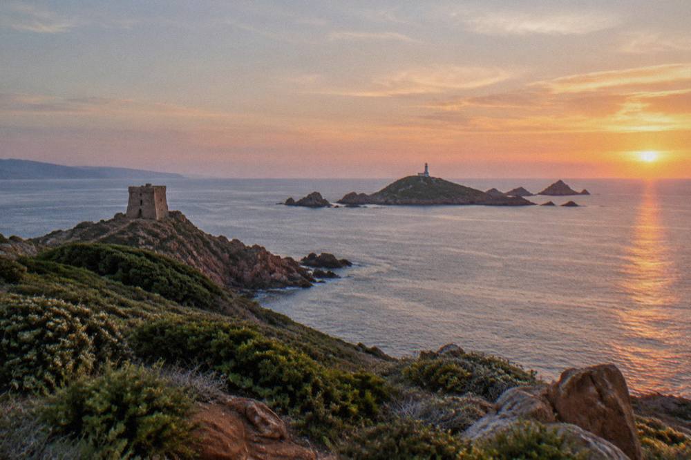 Red granite rocks and a lighthouse on the Îles Sanguinaires off Ajaccio