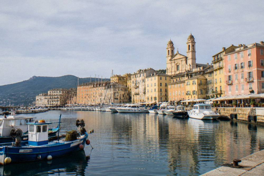 The old harbour of Bastia with boats moored along the quay