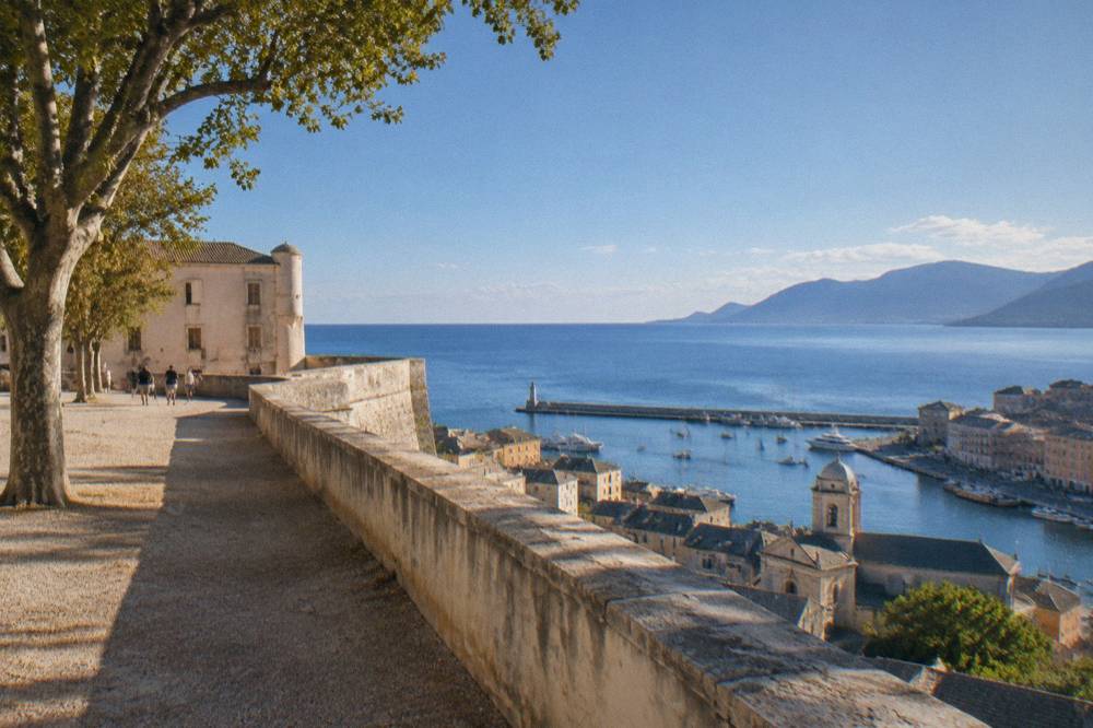 View from the citadel ramparts over the old harbour and the sea toward Italy