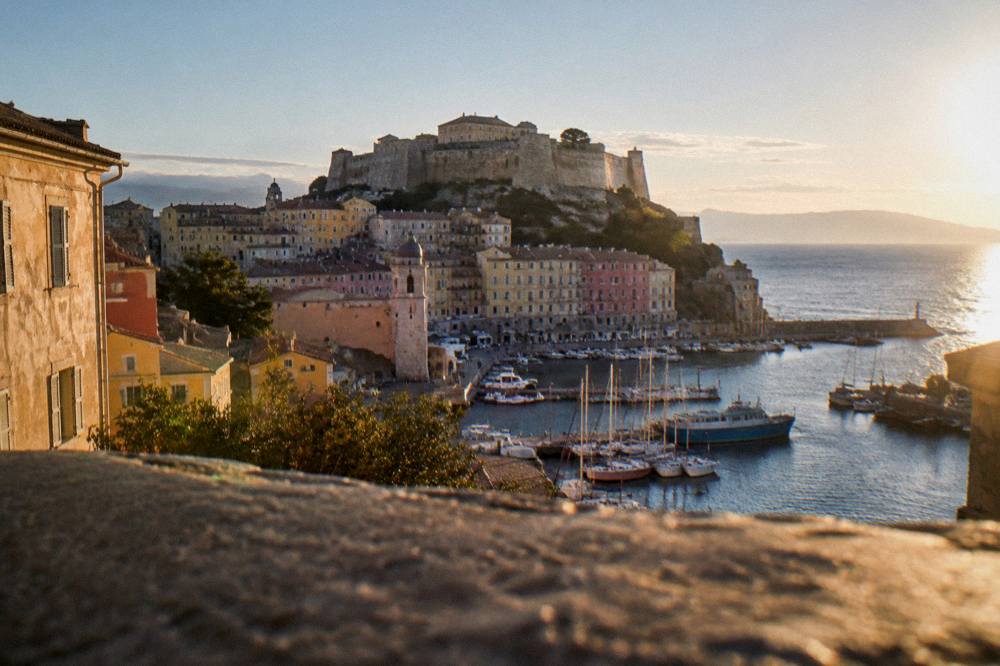 Panorama of Bastia with the citadel above the town and the sea horizon beyond