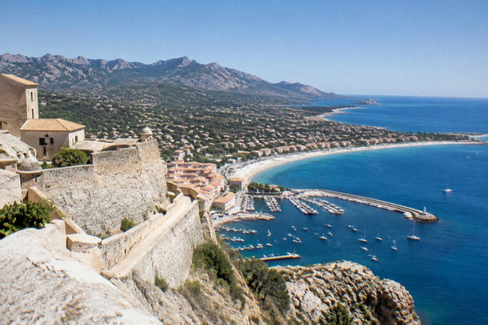The coastline of the Balagne seen from above with the sea stretching to the horizon