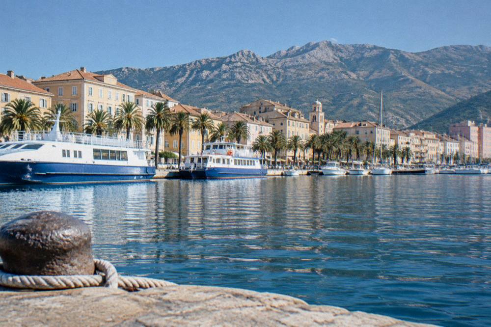 Ferry boats moored along the waterfront of Ajaccio