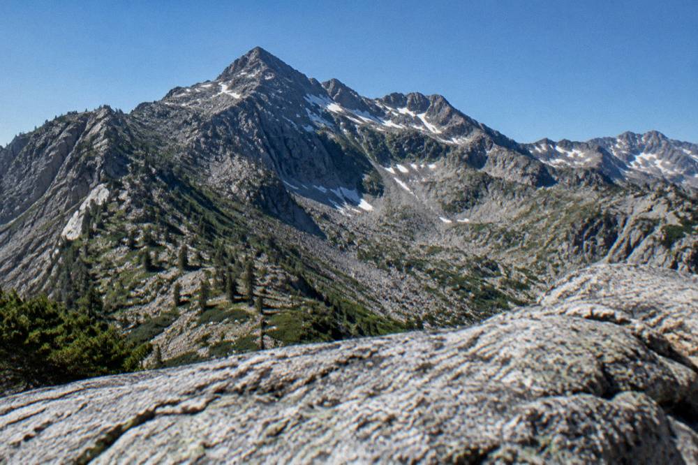 Sunlight over mountain ridges in southern Corsica in summer