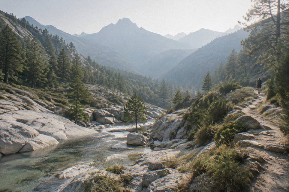 Evening light over a river valley in the mountains of Corsica