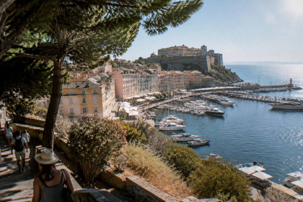 Harbour water and moored boats in Bastia under a clear summer sky