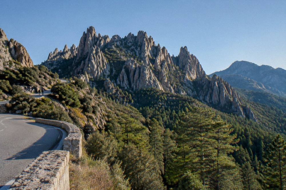View over forested mountains of southern Corsica from a high roadside viewpoint