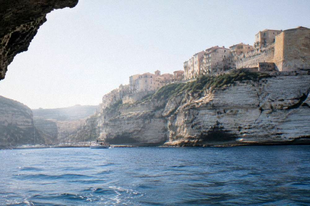 The clifftop town of Bonifacio seen from the water below