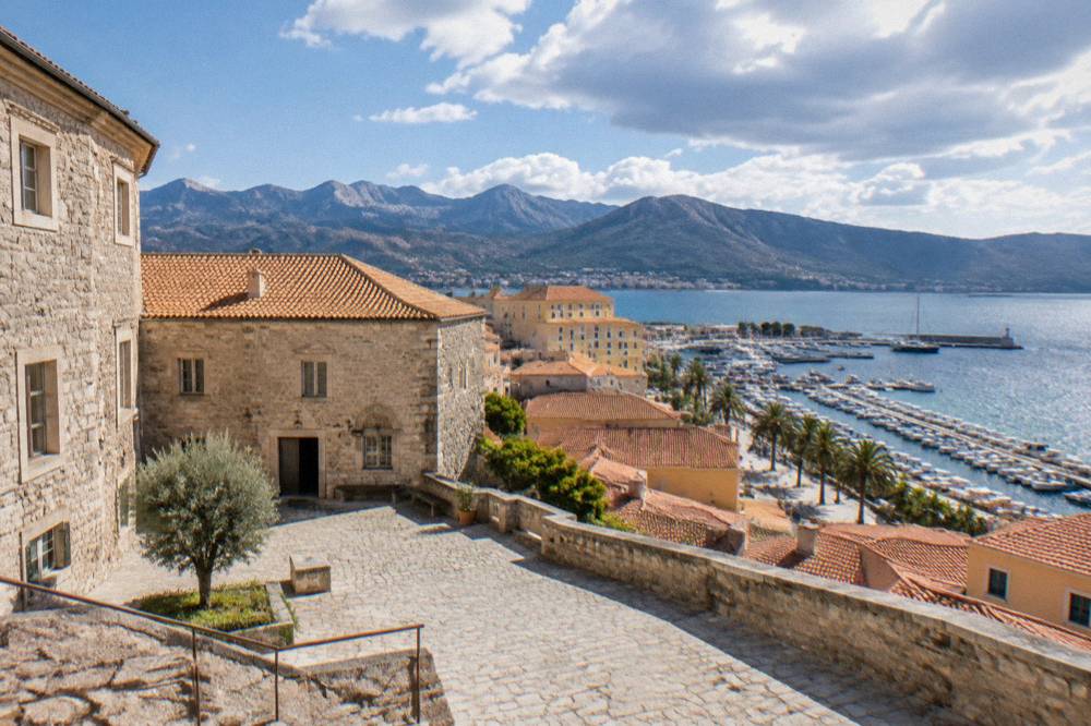 The stone facade and courtyard of a museum building in Ajaccio