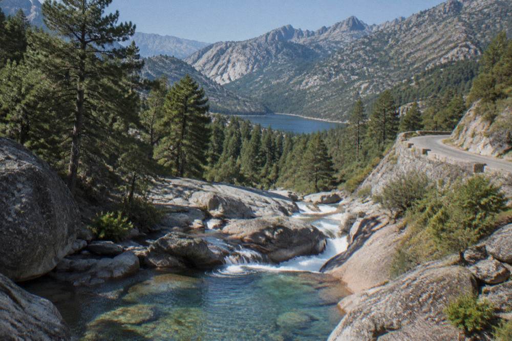 A mountain lake and bare granite slopes in the Restonica valley above Corte