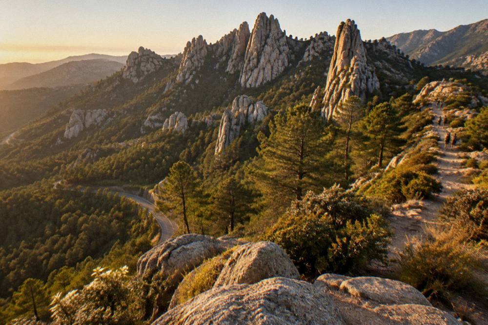 Granite peaks of the Aiguilles de Bavella above pine forest in southern Corsica