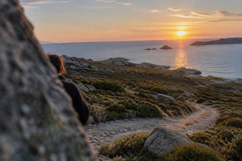 Sunset over the sea and rocky islets on the Corsican coast