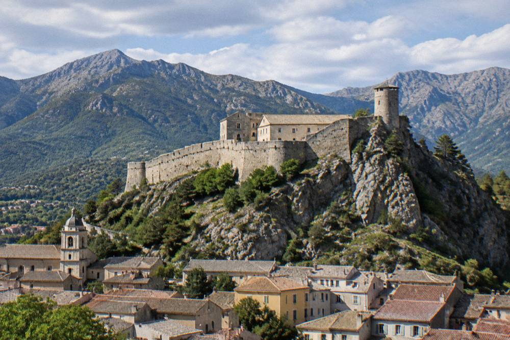 The stone citadel of Corte above rooftops in the Corsican interior