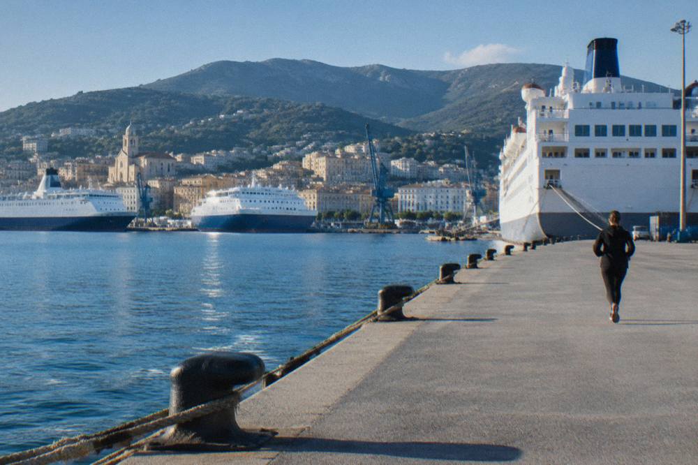 The port of Bastia seen from the sea with ferries moored along the quay