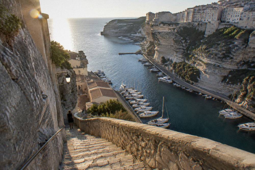 A stone staircase of 189 steps descending a cliff face above the sea