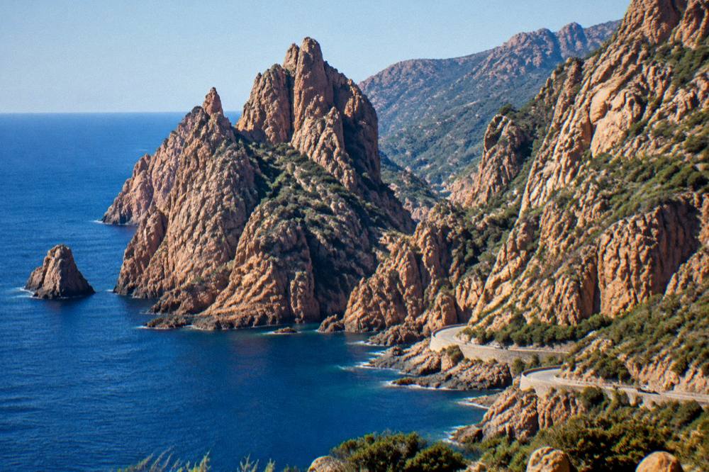 Red granite cliffs of the Calanques de Piana on the west coast of Corsica