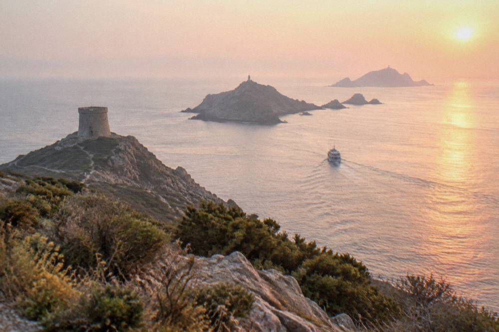 A boat approaching the rocky Îles Sanguinaires at the entrance to the Gulf of Ajaccio