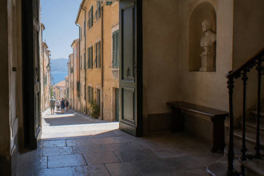 The entrance hall of Maison Bonaparte museum on a narrow street in Ajaccio old town