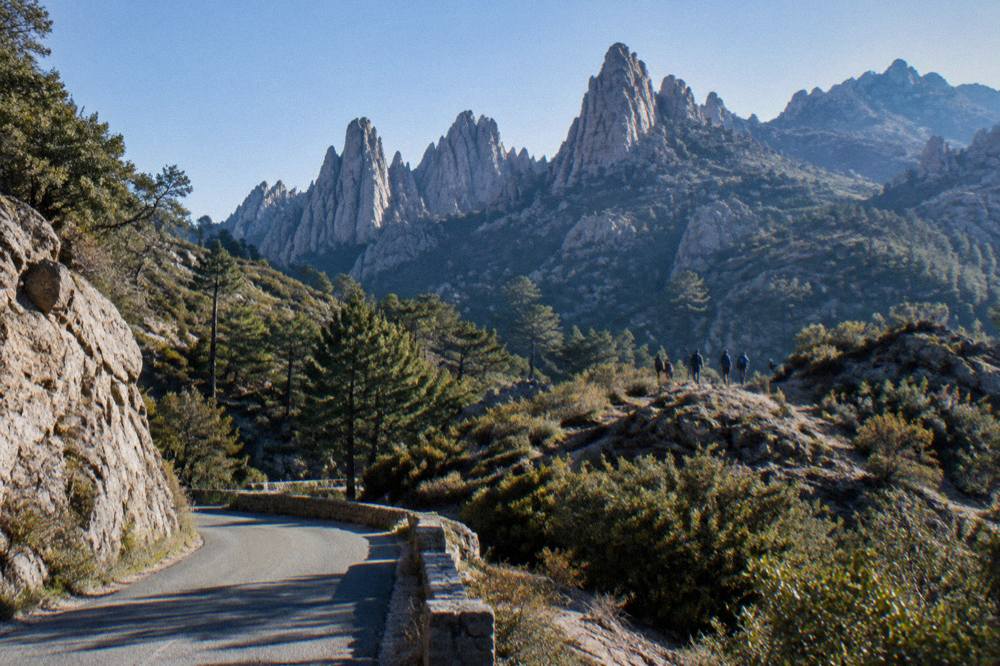 A narrow mountain road winding through maquis and rock in northern Corsica